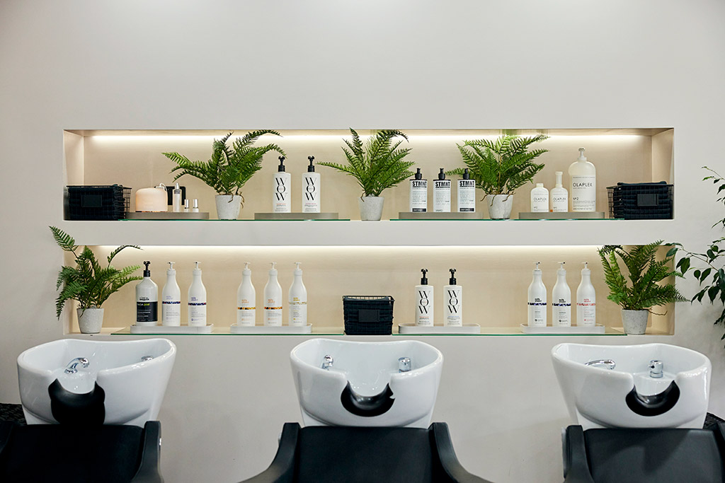 Close up picture on sinks and high quality hair products on offer